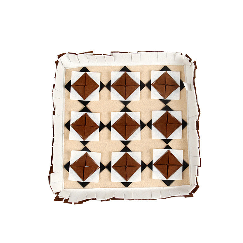 The dog sniffs the mat